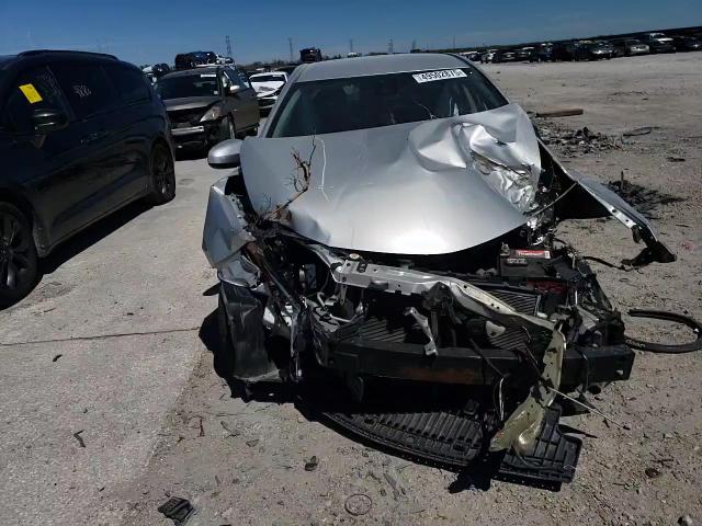 2018 Toyota Corolla VIN 5YFBURHEXJP824970 Copart auction photo, all over damage thumbnail 11