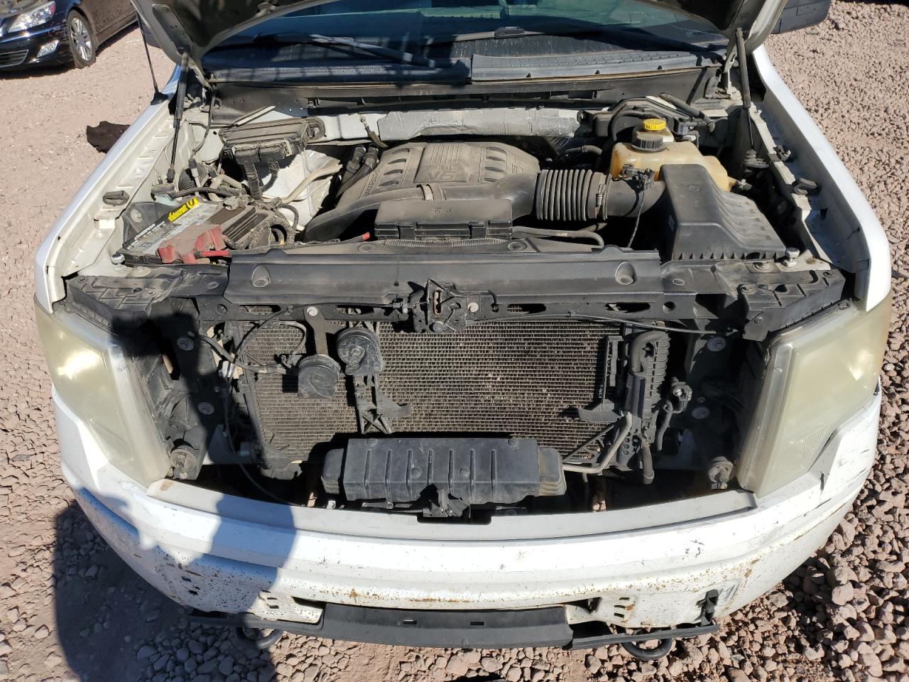 2014 Ford F-150 VIN 1FTFW1ET5EKG25734 Copart auction photo, side / front end damage thumbnail 11