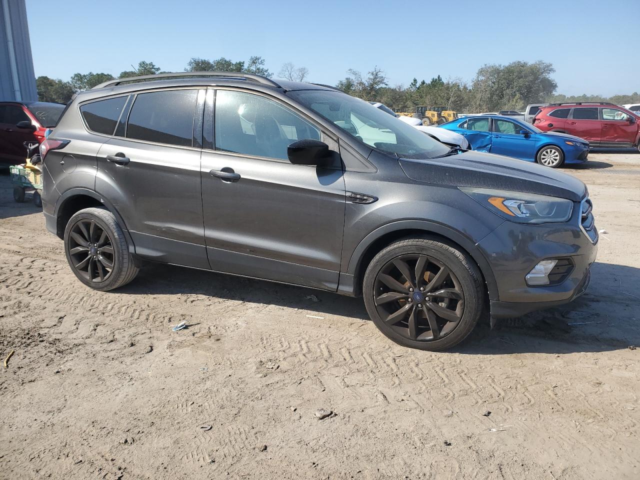 2017 Ford Escape VIN 1FMCU0GD0HUD15844 Copart auction photo, minor dent/scratches damage thumbnail 4