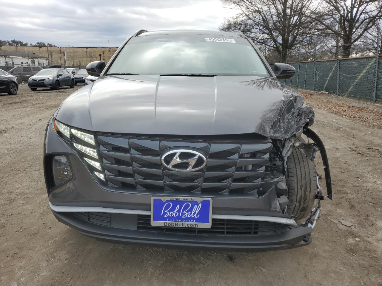 2022 Hyundai Tucson VIN 5NMJBCAE0NH070468 Copart auction photo, front end / minor dent/scratches damage thumbnail 5