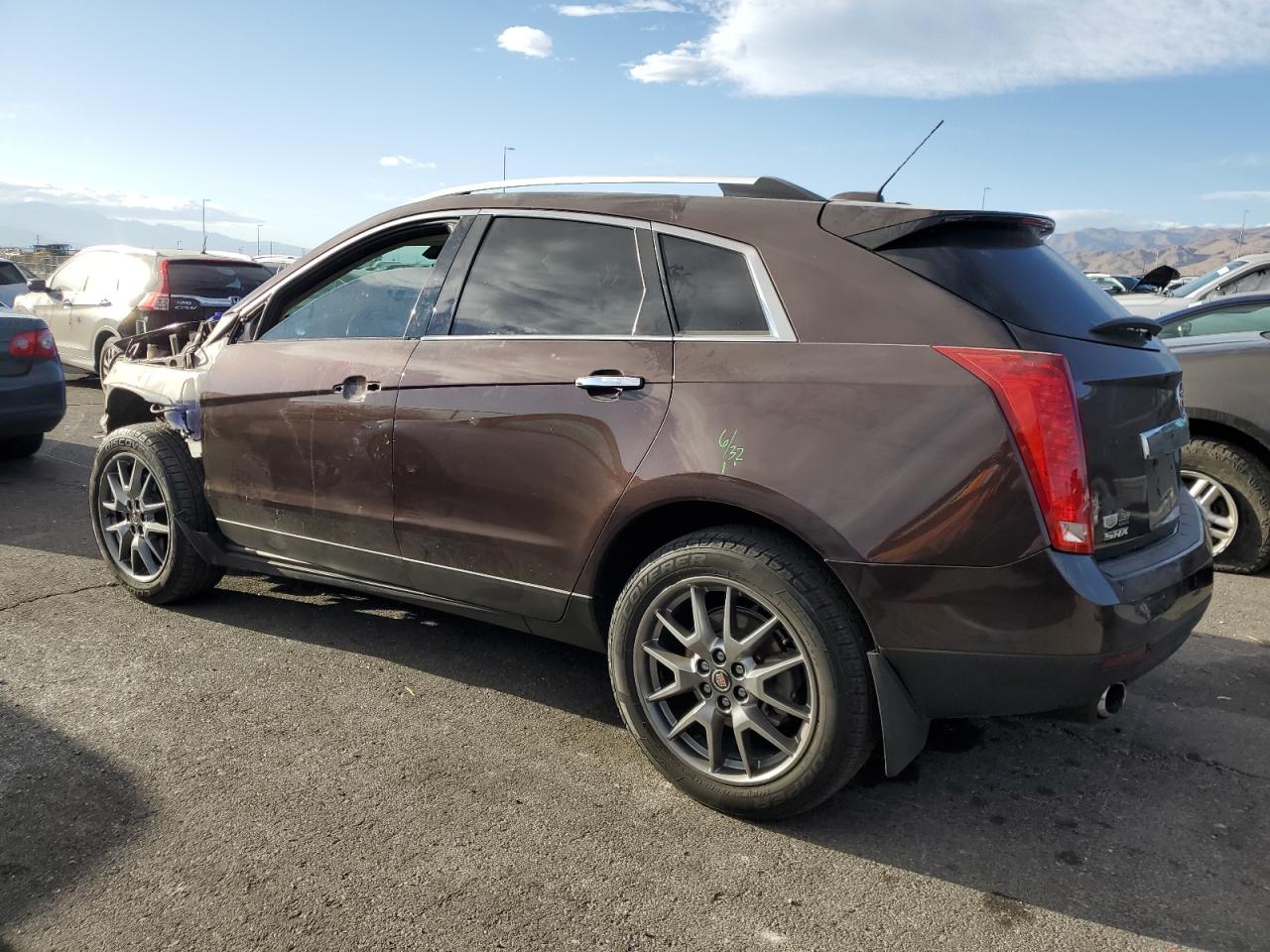 2015 Cadillac SRX VIN 3GYFNCE35FS552623 Copart auction photo, front end damage thumbnail 2