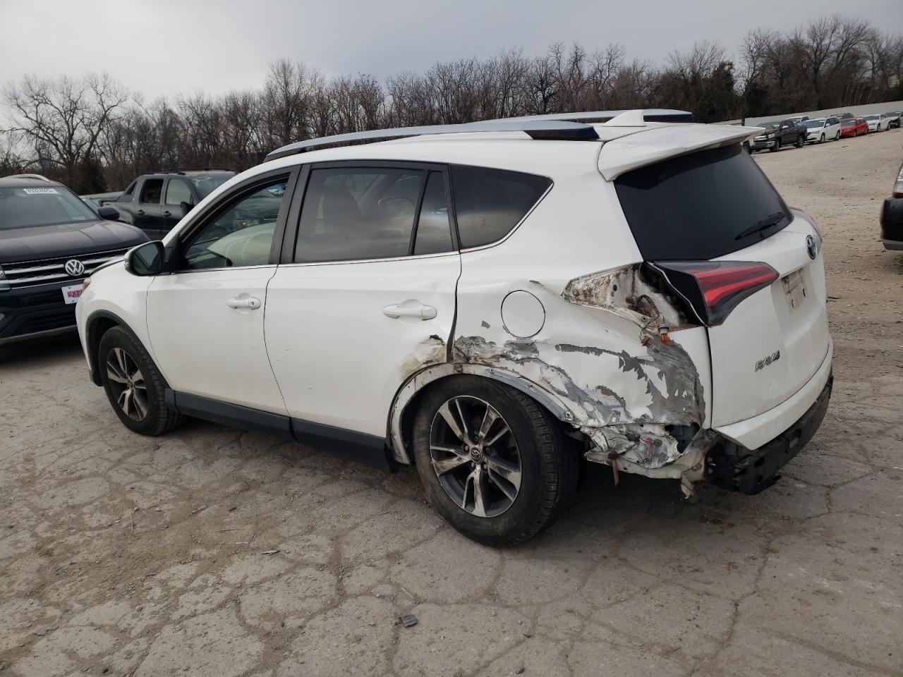 2017 Toyota RAV 4 VIN JTMWFREV7HJ110163 Copart auction photo, side / rear end damage thumbnail 2
