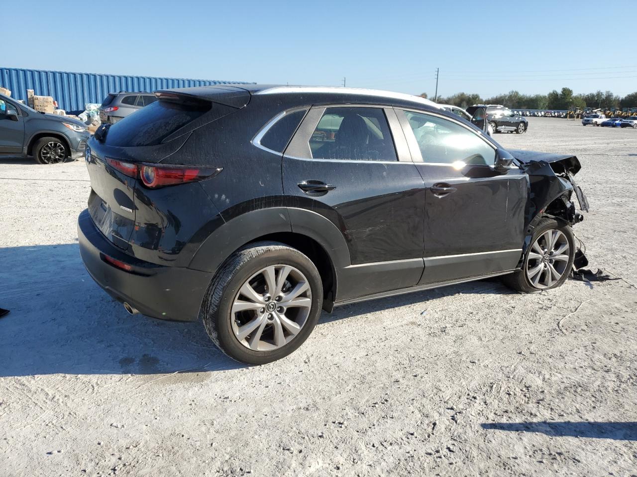 2023 Mazda CX-30 VIN 3MVDMBCM6PM510794 Copart auction photo, front end damage thumbnail 3