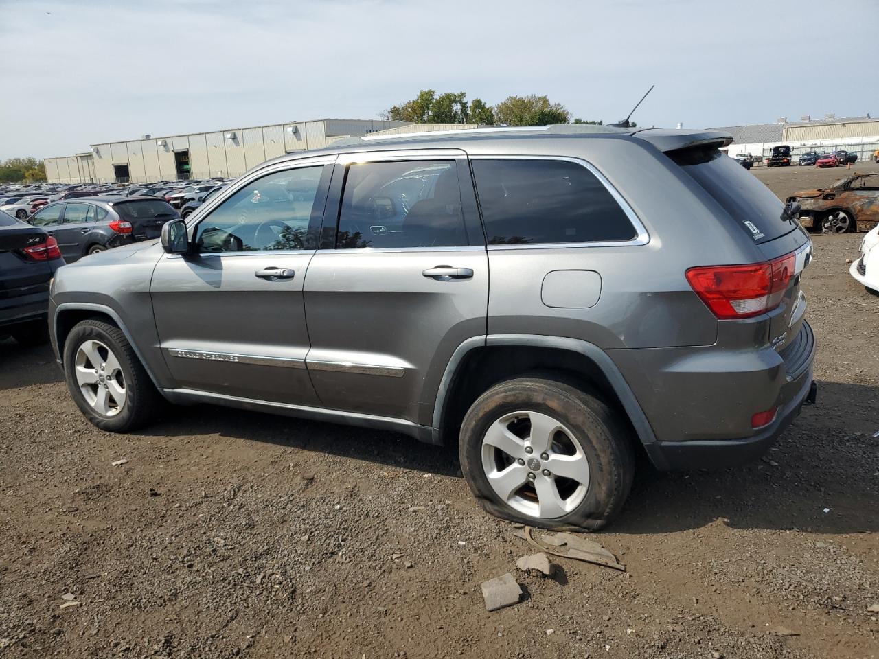2011 Jeep Grand Cherokee VIN 1J4RR4GG5BC717755 Copart auction photo, front end / minor dent/scratches damage thumbnail 2