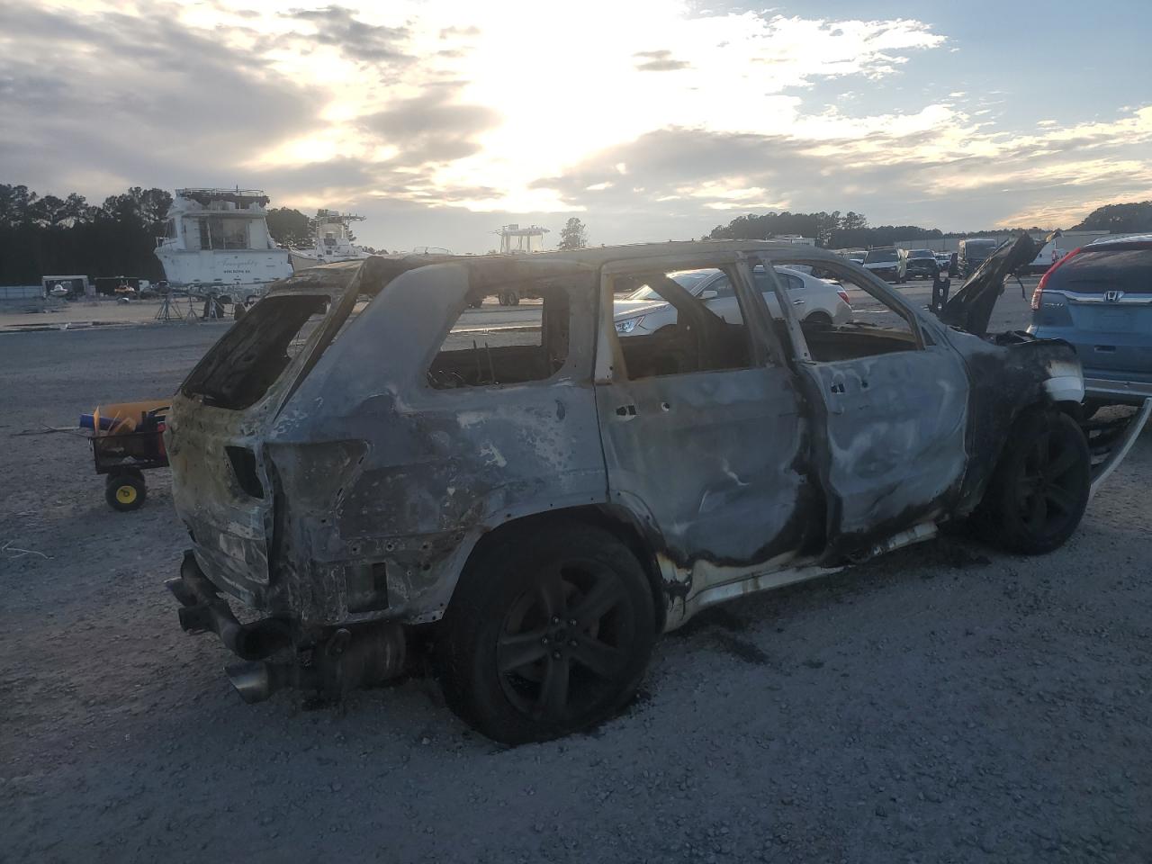 2014 Jeep Grand Cherokee VIN 1C4RJFDJ8EC290018 Copart auction photo, burn damage thumbnail 3