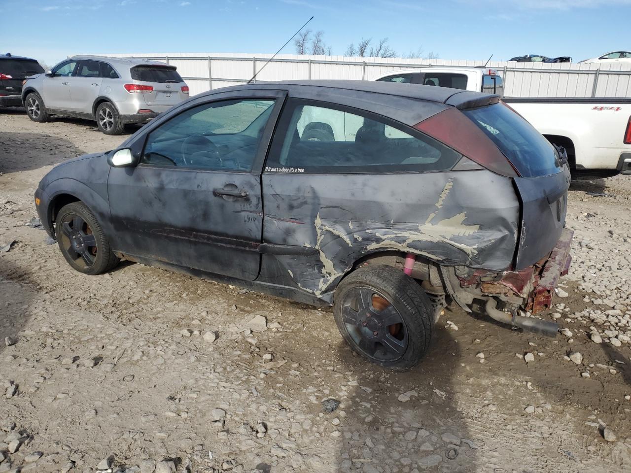 2003 Ford Focus VIN 3FAFP31393R112869 Copart auction photo, side / rear end damage thumbnail 2