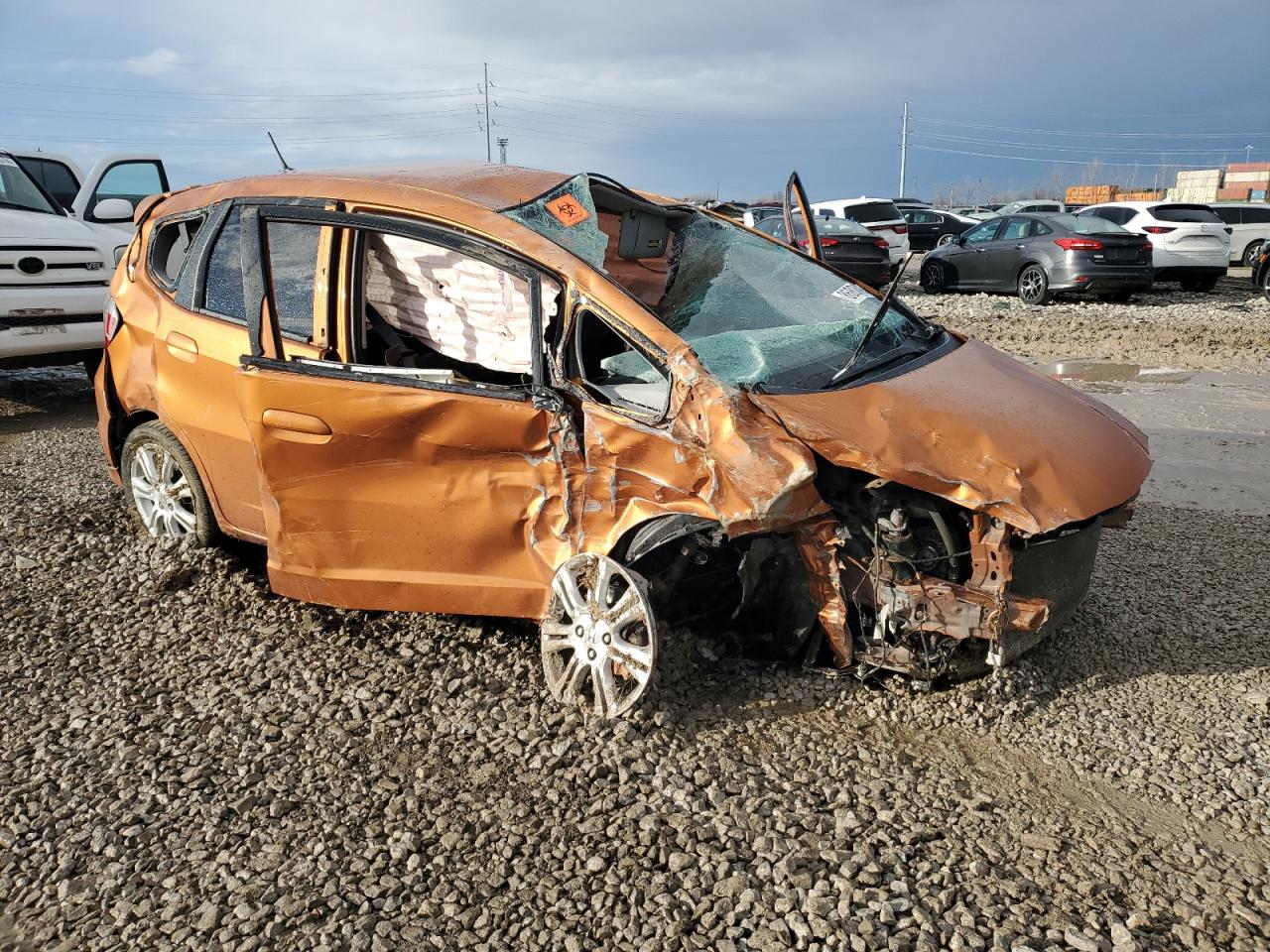 2009 Honda Fit VIN JHMGE88459S041505 Copart auction photo, all over damage thumbnail 4