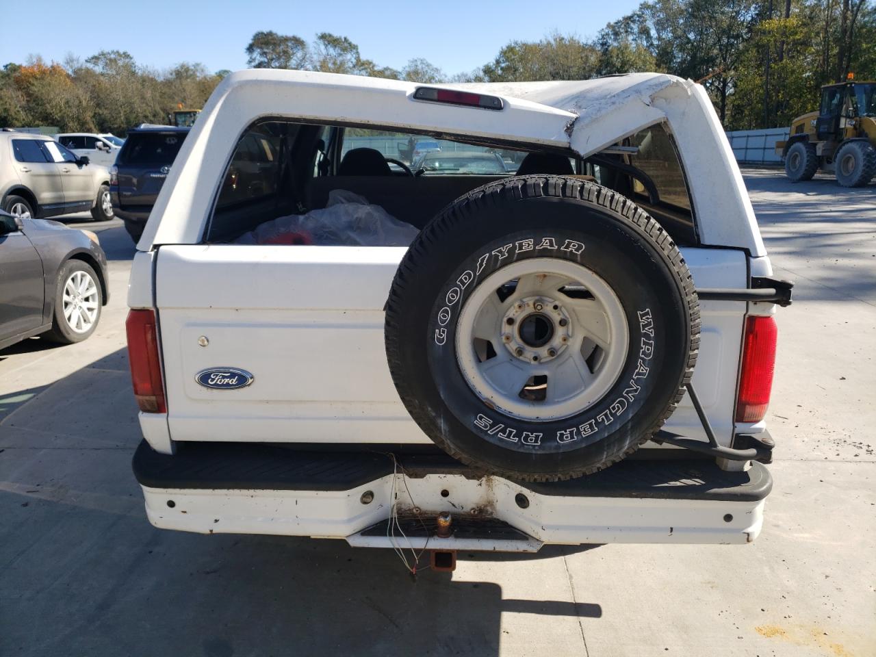 1996 Ford Bronco VIN 1FMEU15N4TLB67027 Copart auction photo, top/roof / side damage thumbnail 6