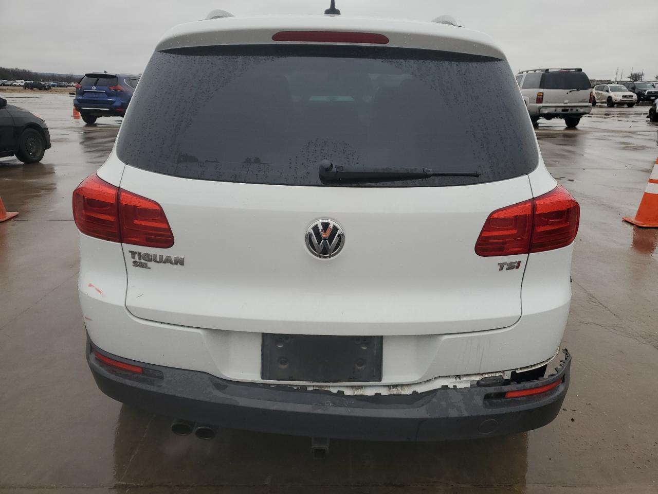 2016 Volkswagen Tiguan VIN WVGAV7AX8GW569613 Copart auction photo, side damage thumbnail 6