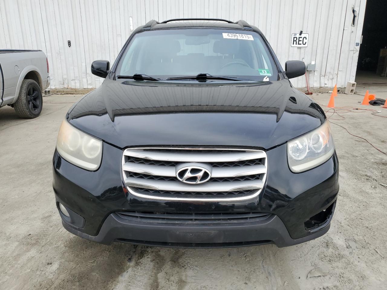2012 Hyundai Santa Fe VIN 5XYZHDAG5CG096466 Copart auction photo, side damage thumbnail 5