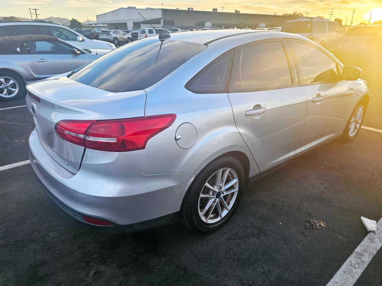 2017 Ford Focus VIN 1FADP3F20HL254640 Copart auction photo, normal wear / minor dent/scratches damage thumbnail 4