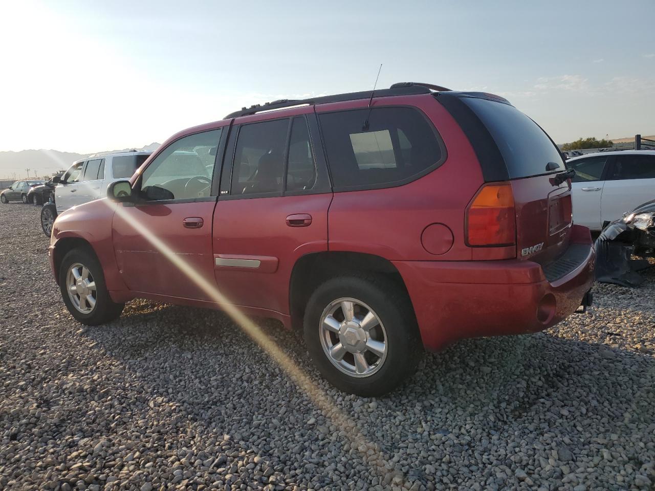 2002 GMC Envoy VIN 1GKDT13S022215529 Copart auction photo, side damage thumbnail 2
