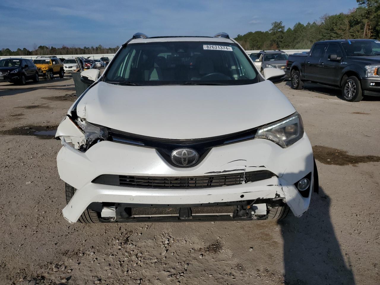 2016 Toyota RAV 4 VIN 2T3DFREV0GW459222 Copart auction photo, front end damage thumbnail 5