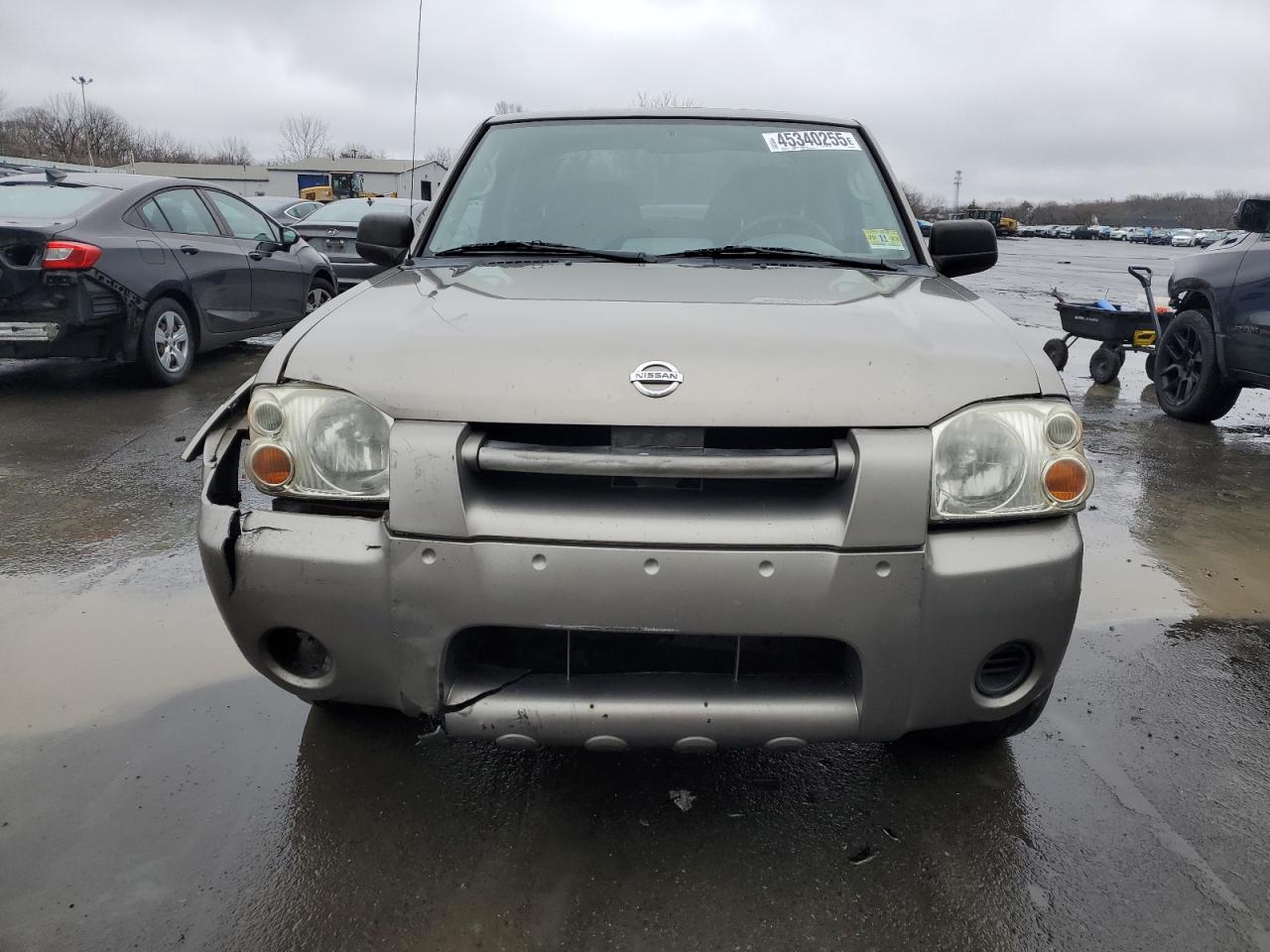 2004 Nissan Navara (Frontier) VIN 1N6ED29YX4C409431 Copart auction photo, front end / rear end damage thumbnail 5
