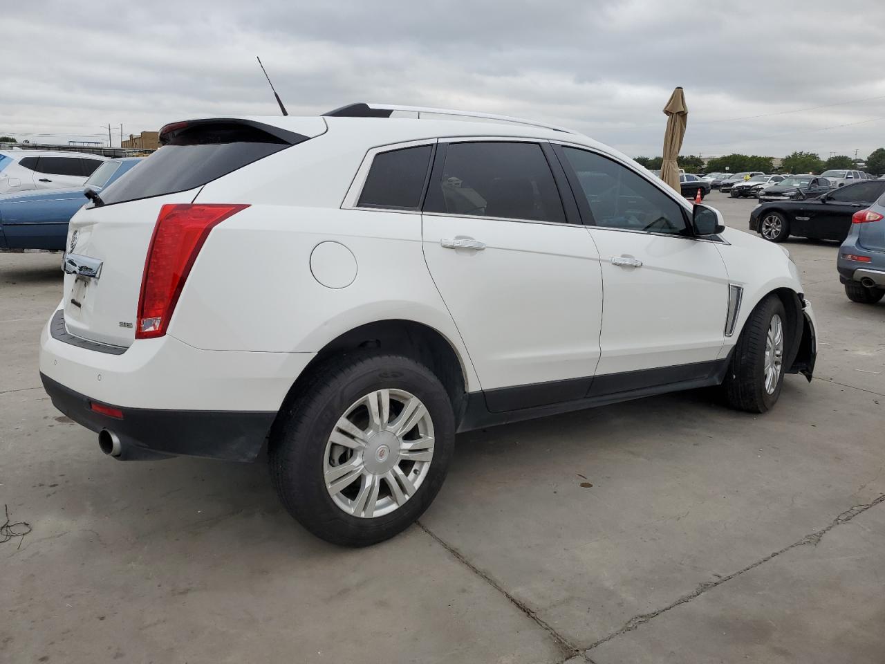 2014 Cadillac SRX VIN 3GYFNBE30ES615975 Copart auction photo, front end / side damage thumbnail 3