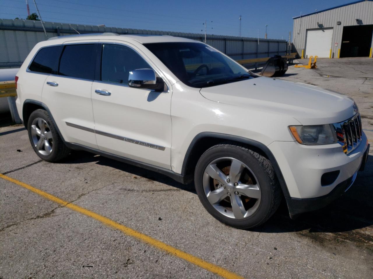 2012 Jeep Grand Cherokee VIN 1C4RJFCT2CC214746 Copart auction photo, hail damage thumbnail 4