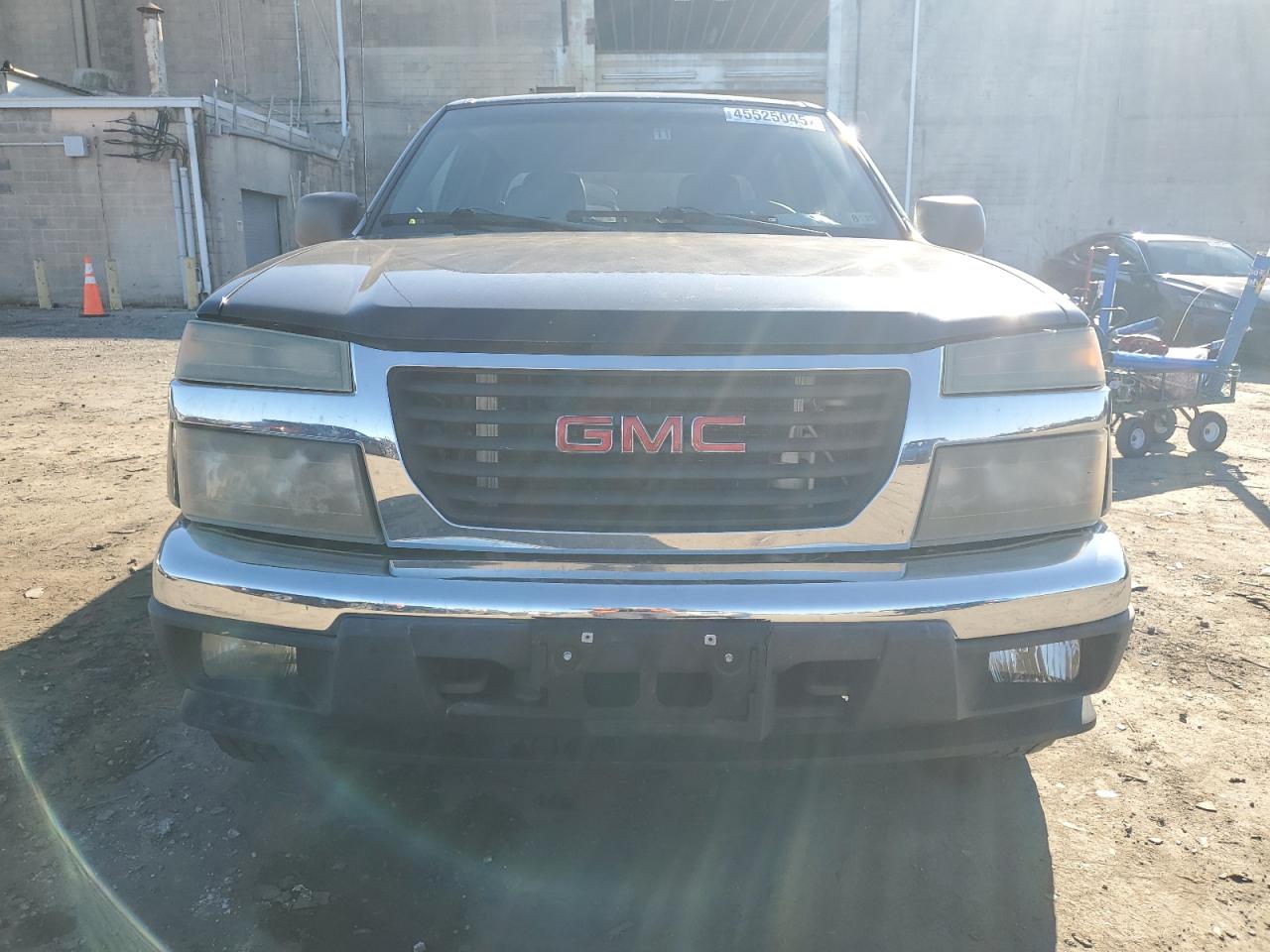 2005 GMC Canyon VIN 1GTDT136158144194 Copart auction photo, side / rear end damage thumbnail 5