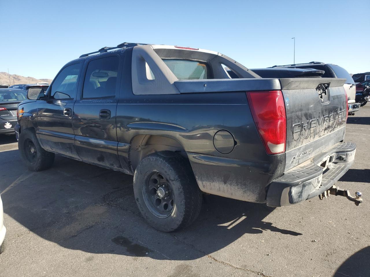 2006 Chevrolet Avalanche VIN 3GNEC12Z96G124021 Copart auction photo, side / rear end damage thumbnail 2