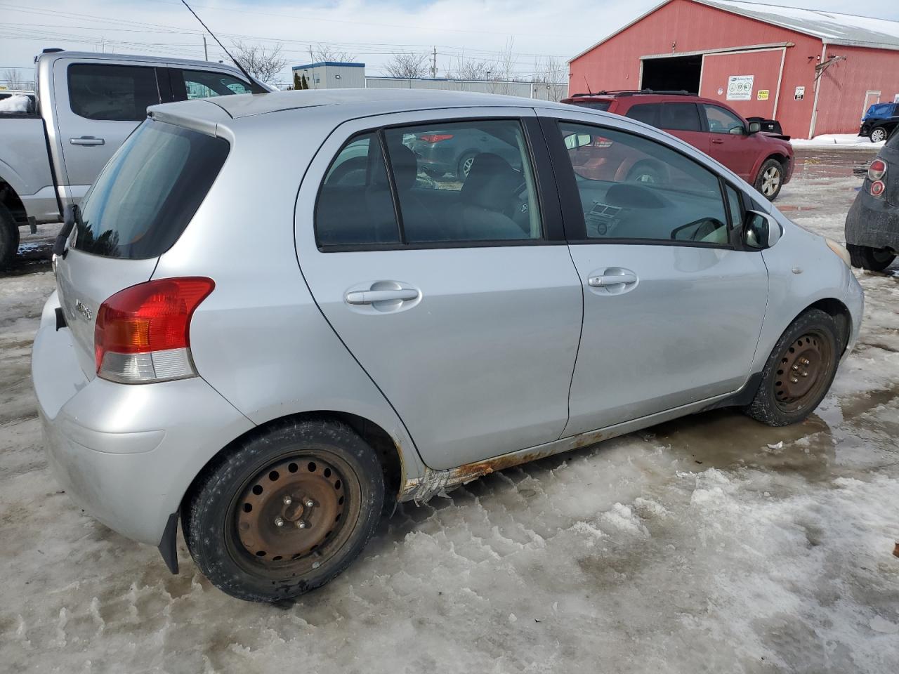 2009 Toyota Yaris VIN JTDKT903095269565 Copart auction photo, minor dent/scratches / mechanical damage thumbnail 3