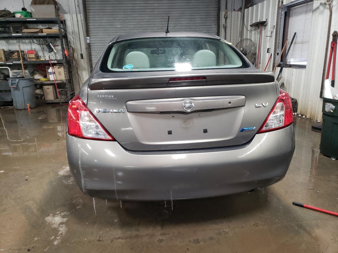 2013 Nissan Versa VIN 3N1CN7AP7DL852912 Copart auction photo, side / rear end damage thumbnail 6