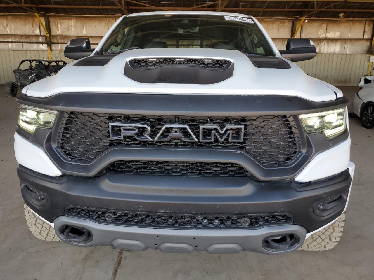 2021 RAM 1500 VIN 1C6SRFU97MN703766 Copart auction photo, damage history damage thumbnail 5