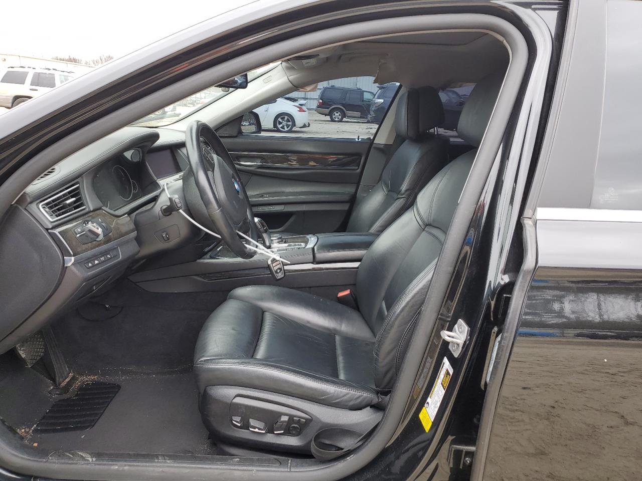 2015 BMW 7er VIN WBAYE8C51FD781877 Copart auction photo, all over damage thumbnail 7