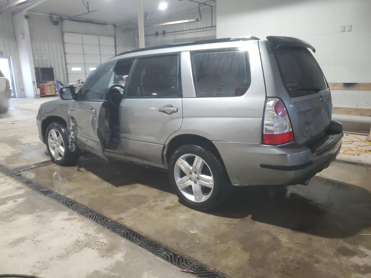 2007 Subaru Forester VIN JF1SG696X7H725959 Copart auction photo, side damage thumbnail 2