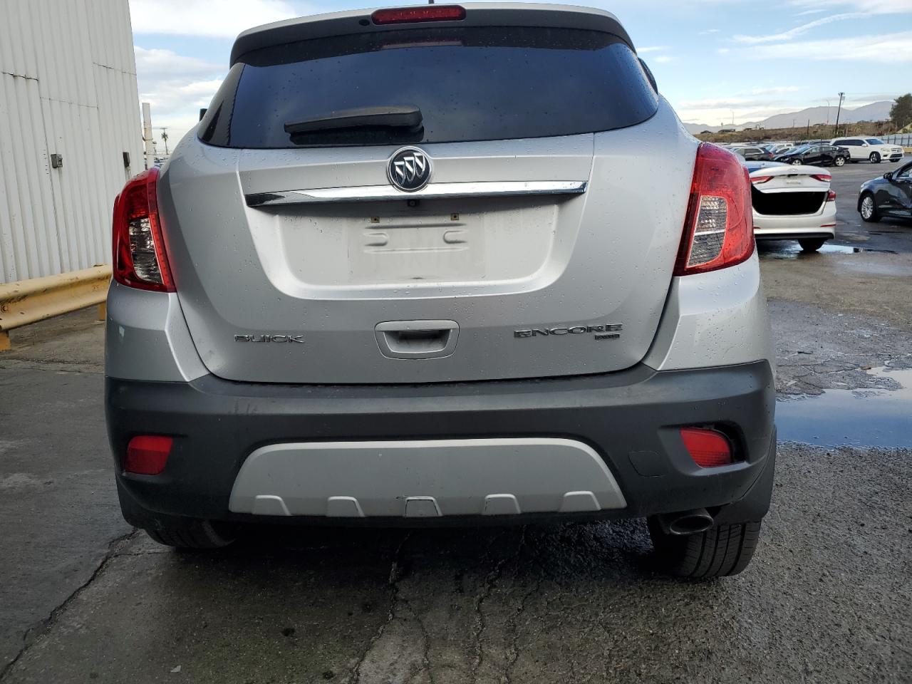 2014 Buick Encore VIN KL4CJFSB6EB581604 Copart auction photo, all over damage thumbnail 6