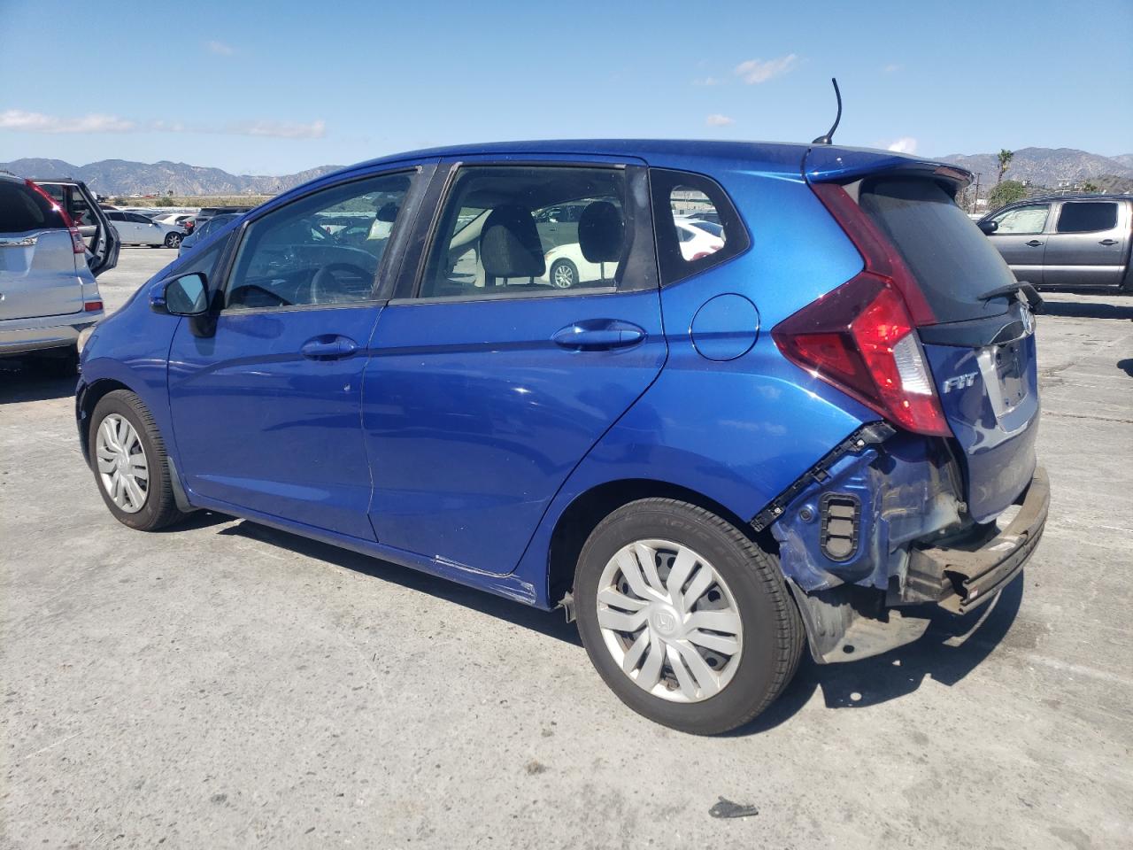 2016 Honda Fit VIN JHMGK5H51GX011692 Copart auction photo, all over damage thumbnail 2