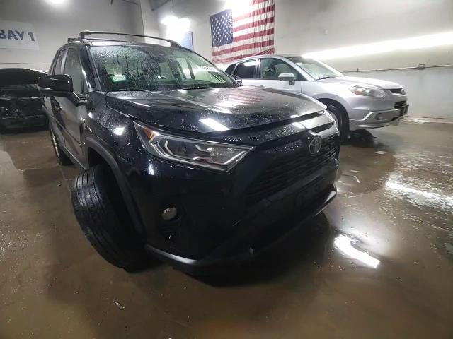 2019 Toyota RAV 4 VIN JTMRWRFV0KD007250 Copart auction photo, side damage thumbnail 14