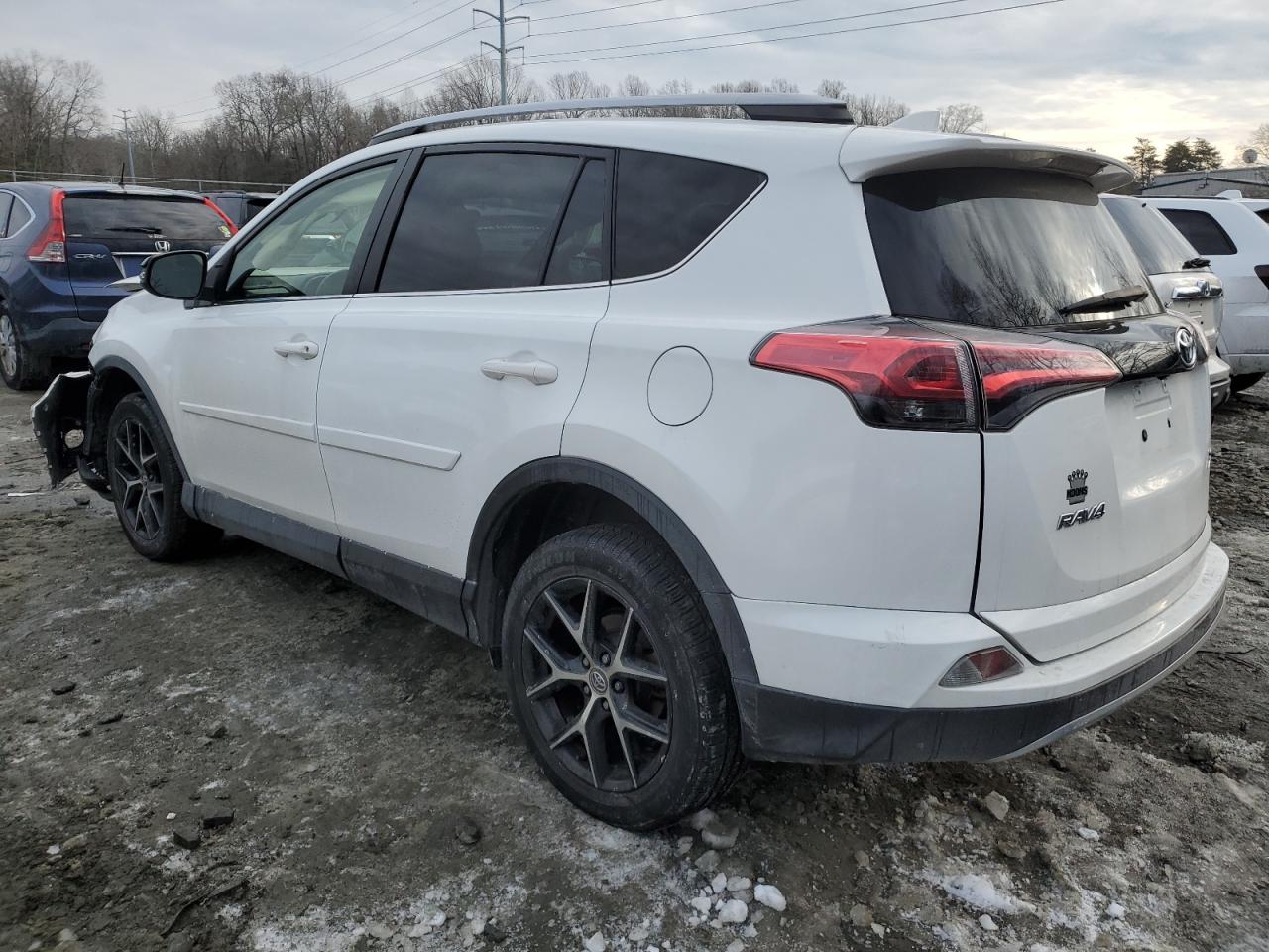 2017 Toyota RAV 4 VIN JTMJFREV2HD218277 Copart auction photo, front end / side damage thumbnail 2
