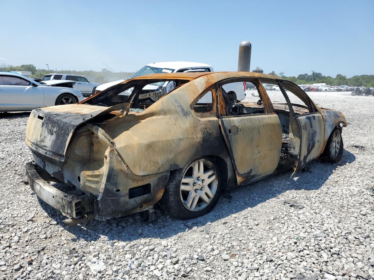 2012 Chevrolet Impala VIN 2G1WG5E3XC1136739 Copart auction photo, burn damage thumbnail 3