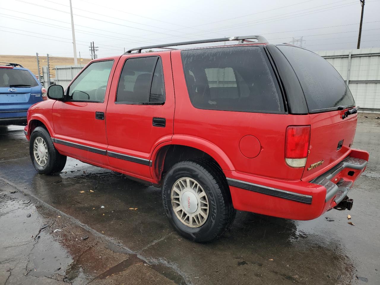 1998 GMC Jimmy VIN 1GKDT13W1W2508350 Copart auction photo, side damage thumbnail 2