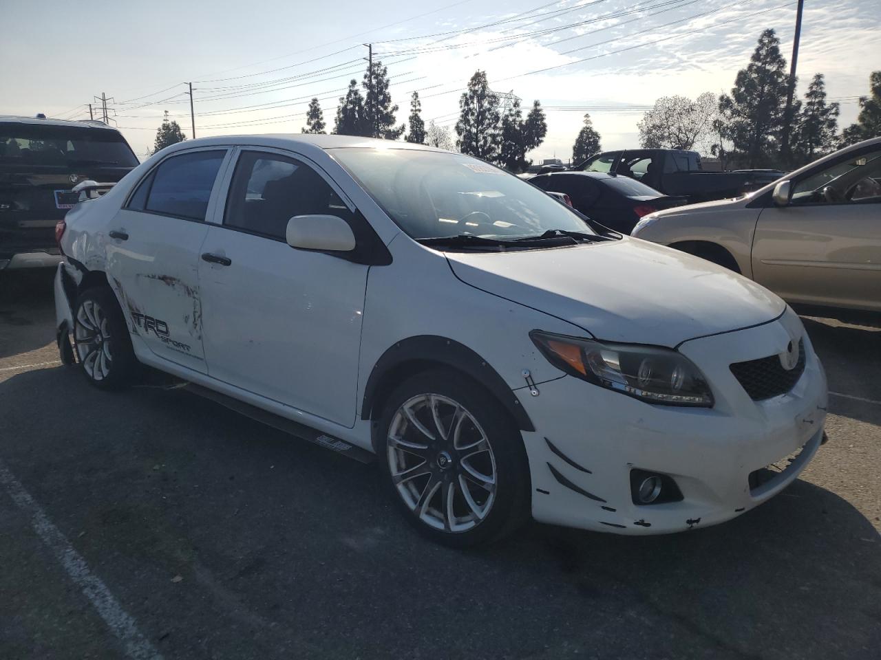 2009 Toyota Corolla VIN JTDBL40E999037883 Copart auction photo, side / mechanical damage thumbnail 4