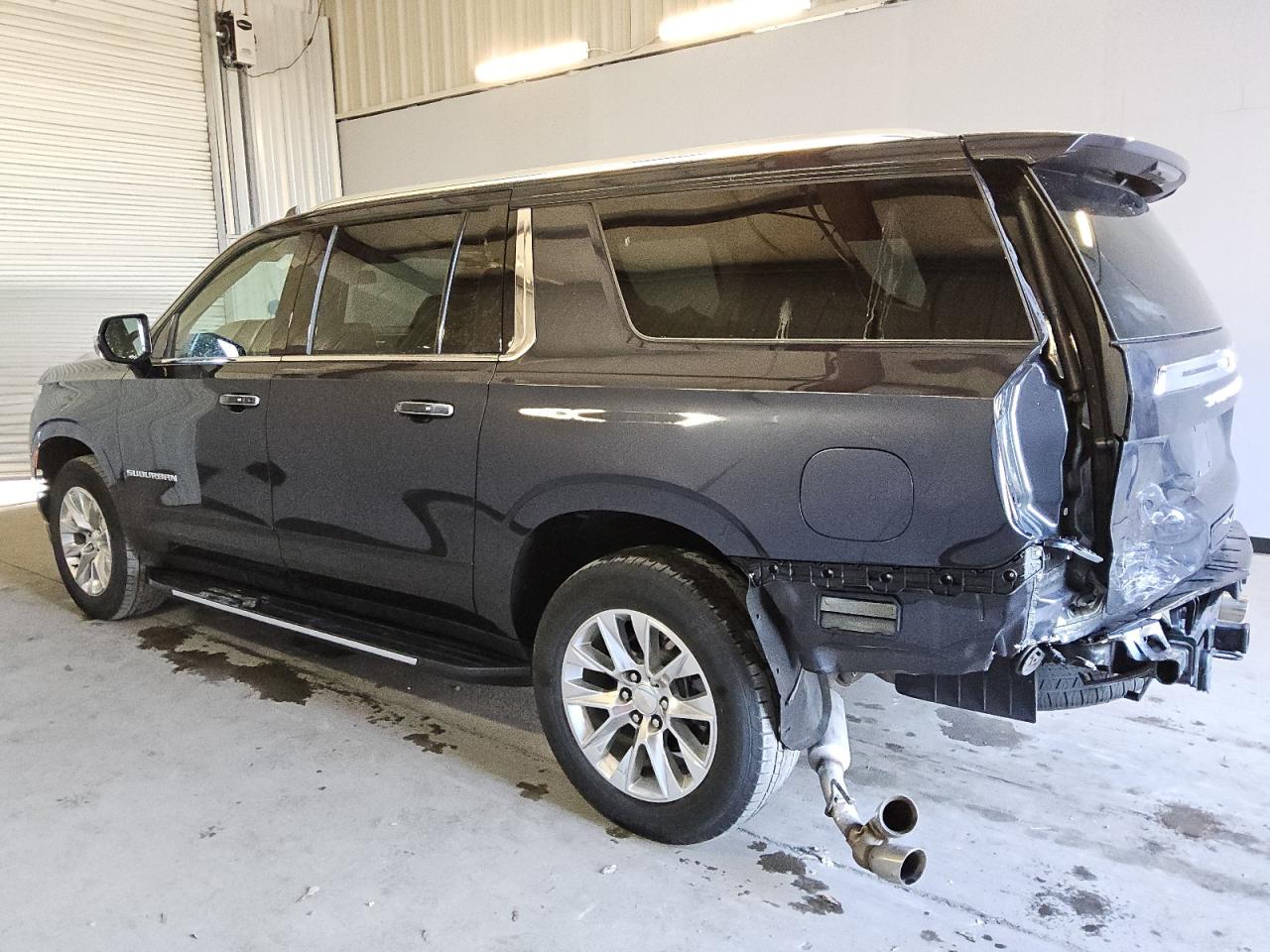 2023 Chevrolet Suburban VIN 1GNSCFKD8PR333000 Copart auction photo, rear end / side damage thumbnail 2
