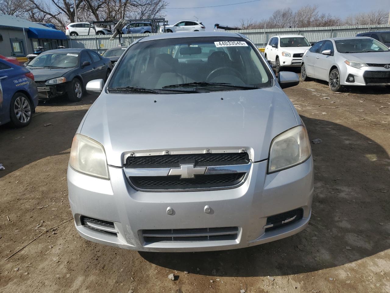 2009 Chevrolet Aveo VIN KL1TD56E49B354887 Copart auction photo, side / rear end damage thumbnail 5