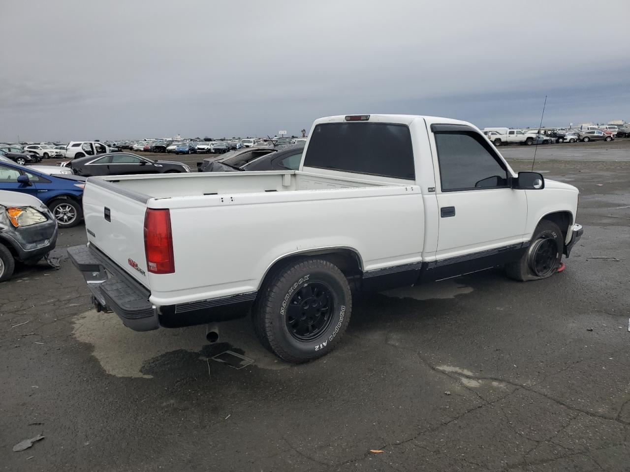 1995 GMC Sierra VIN 1GTEC14K5SZ563560 Copart auction photo, side damage thumbnail 3