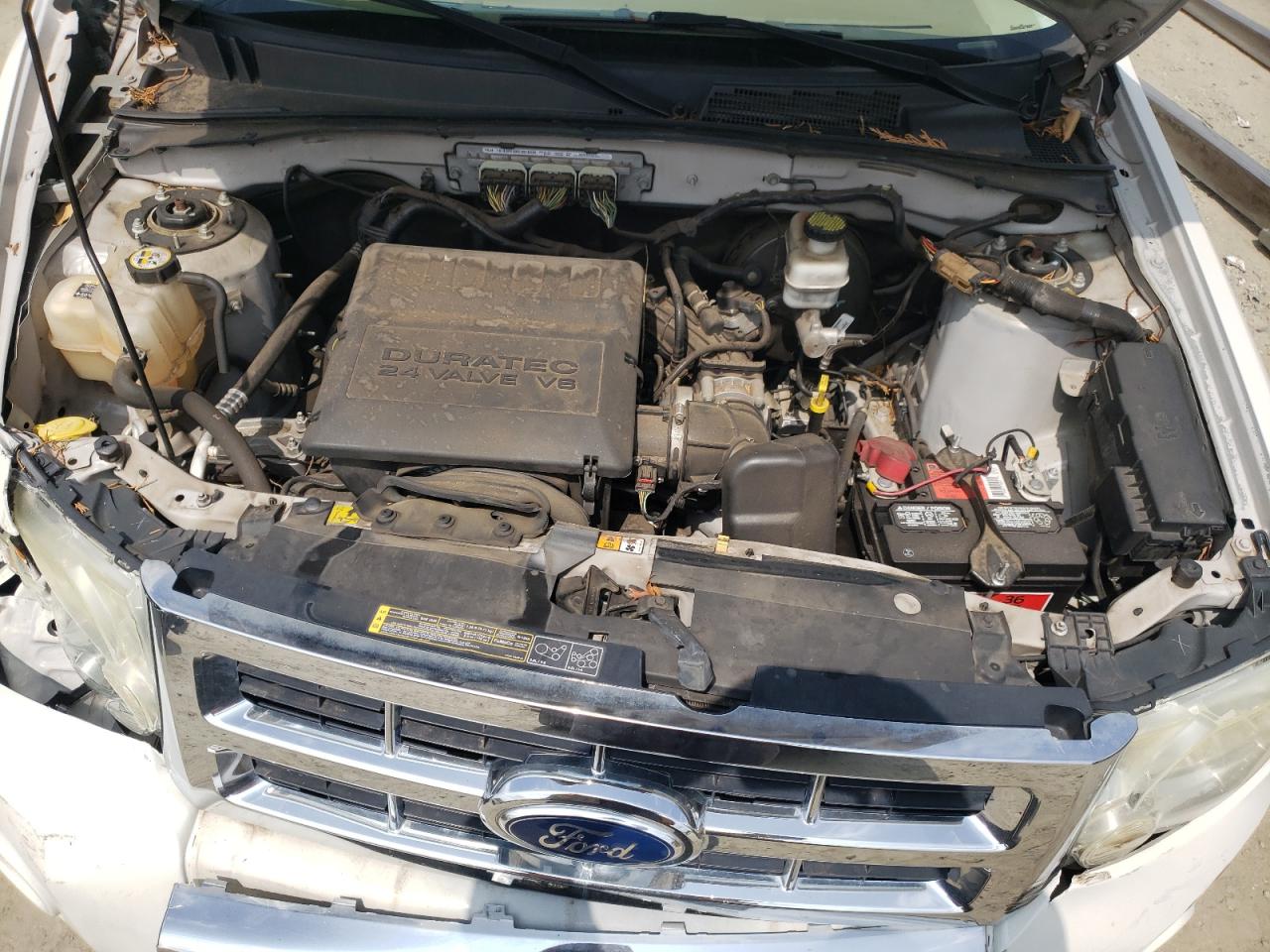 2011 Ford Escape VIN 1FMCU0EG3BKC70253 Copart auction photo, front end / side damage thumbnail 12