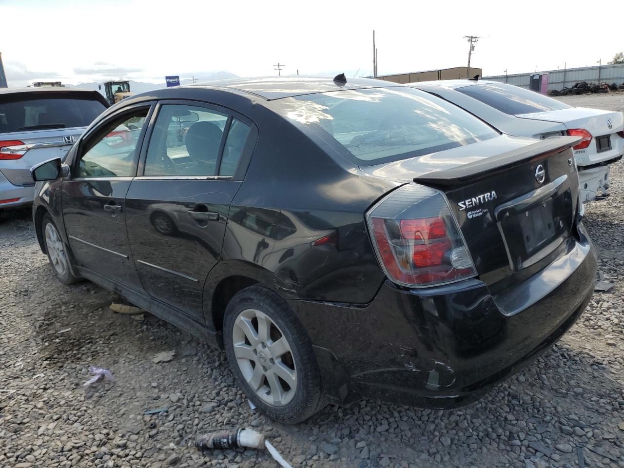 2009 Nissan Sentra VIN 3N1AB61E19L688380 Copart auction photo, vandalism damage thumbnail 2