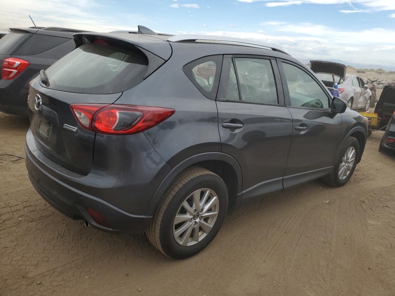 2016 Mazda CX-5 VIN JM3KE4BY6G0882393 Copart auction photo, hail damage thumbnail 3