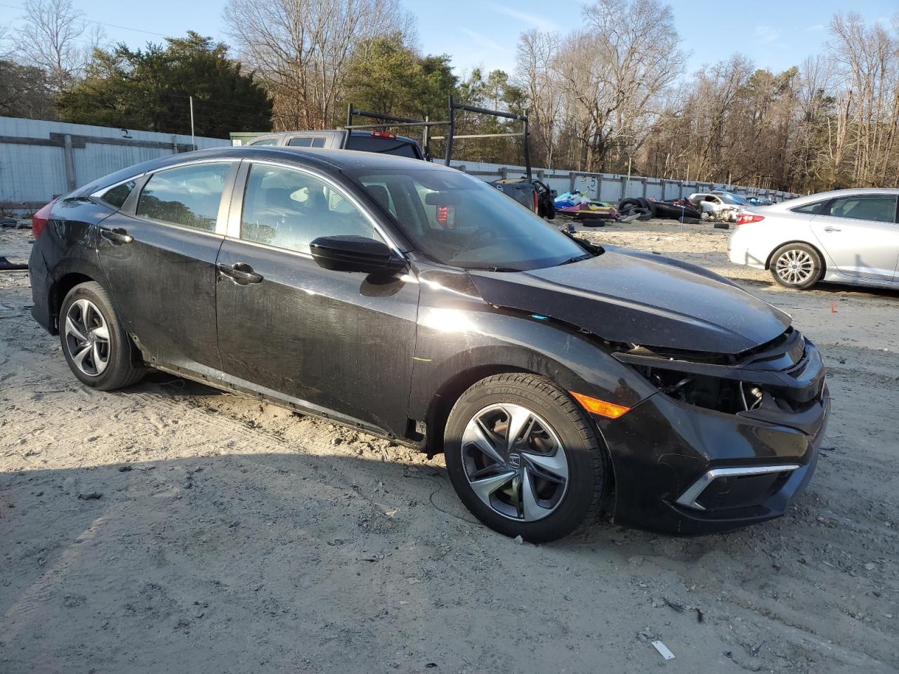2019 Honda Civic VIN 2HGFC2F6XKH559144 Copart auction photo, front end / minor dent/scratches damage thumbnail 4
