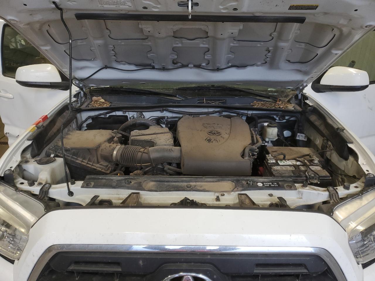 2016 Toyota Tacoma VIN 5TFSZ5AN1GX024041 Copart auction photo, all over damage thumbnail 11