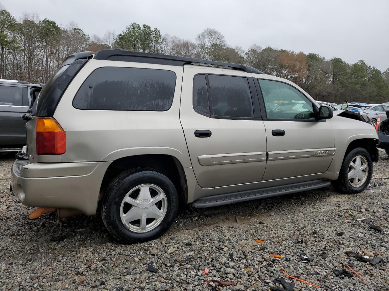 2003 GMC Envoy VIN 1GKES16S736149445 Copart auction photo, front end / side damage thumbnail 3