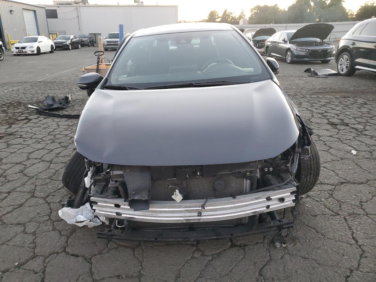 2021 Toyota Corolla VIN JTND4MBE0M3140636 Copart auction photo, all over damage thumbnail 5