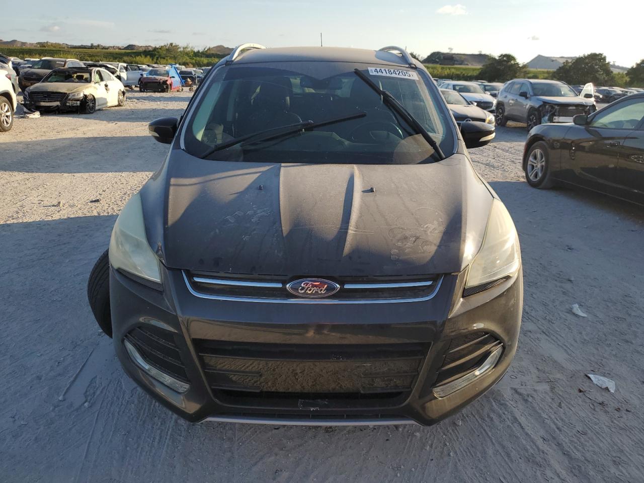 2015 Ford Escape VIN 1FMCU0J90FUC40337 Copart auction photo, front end / side damage thumbnail 5