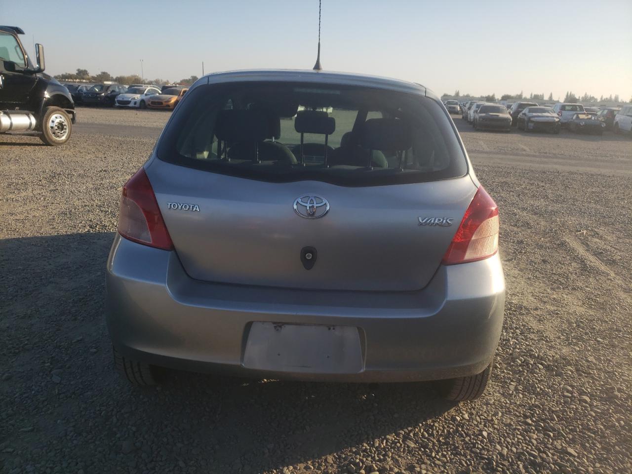 2007 Toyota Yaris VIN JTDJT923175106395 Copart auction photo, minor dent/scratches damage thumbnail 6