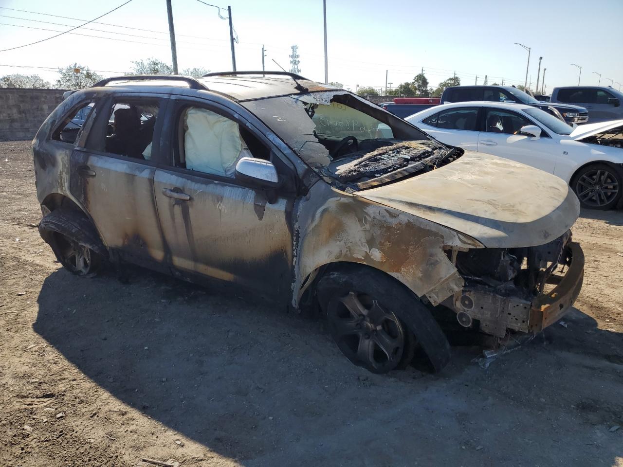 2013 Ford Edge VIN 2FMDK3JCXDBC29663 Copart auction photo, burn / all over damage thumbnail 4