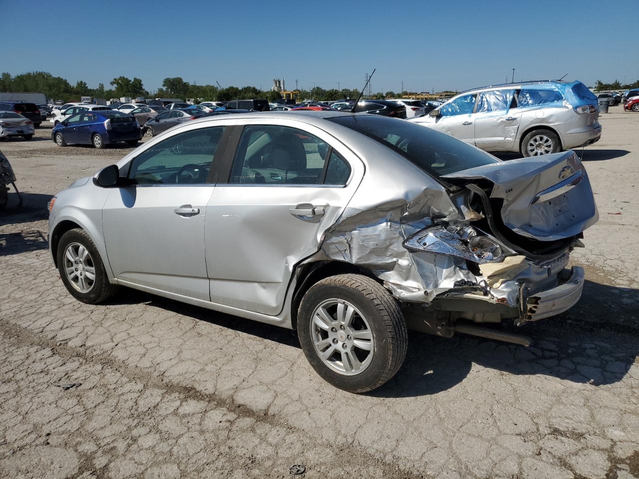 2012 Chevrolet Sonic VIN 1G1JC5SH5C4123052 Copart auction photo, rear end damage thumbnail 2