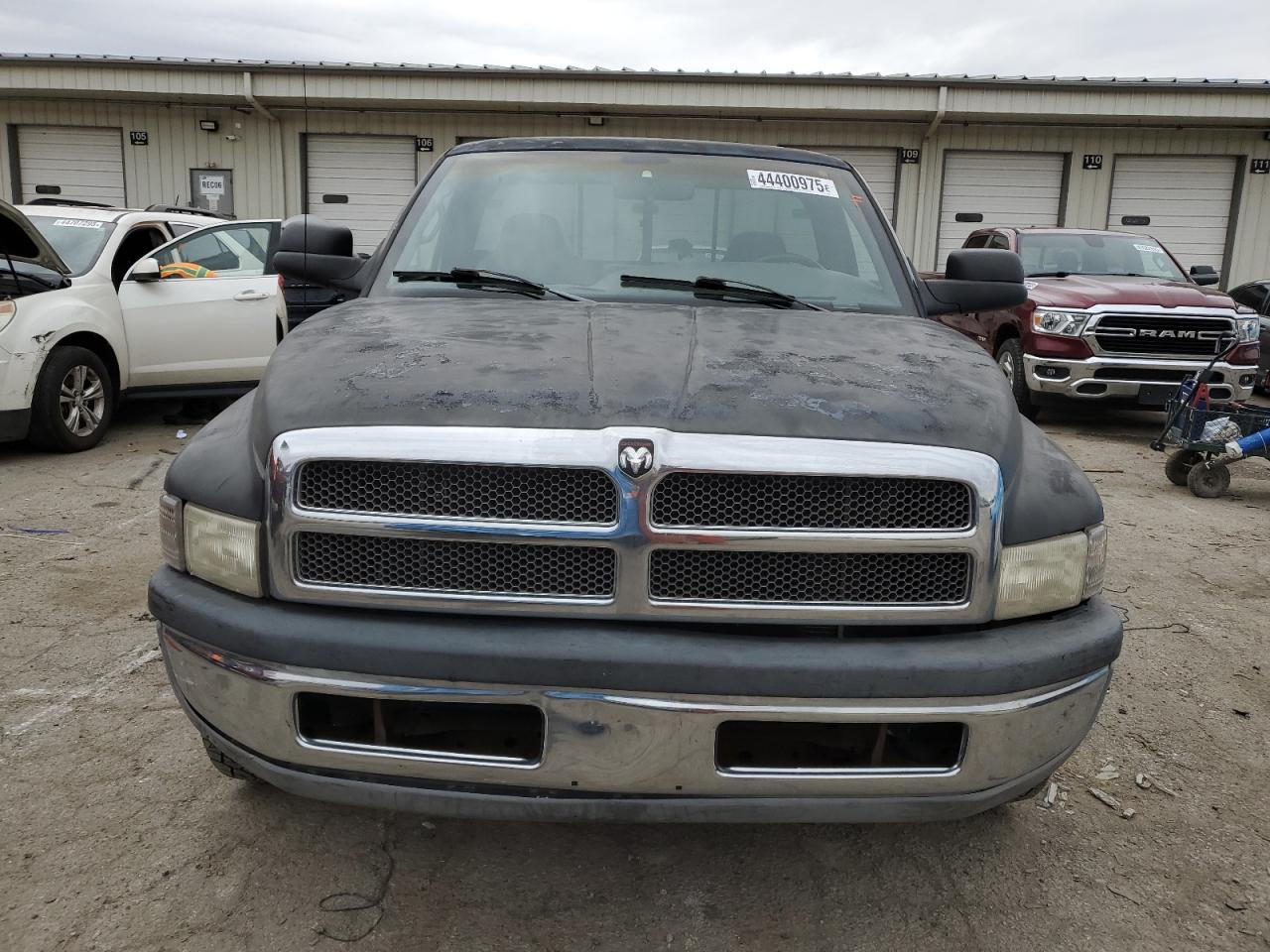 1999 Dodge RAM VIN 1B7HC16YXXS294065 Copart auction photo, rear end / minor dent/scratches damage thumbnail 5