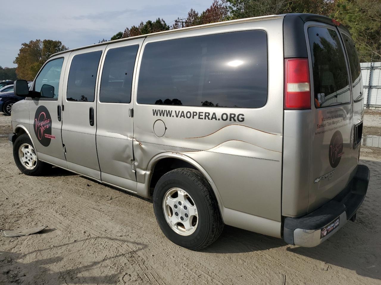2004 Chevrolet Express VIN 1GNFH15T541140063 Copart auction photo, side / rear end damage thumbnail 2